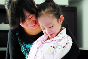 “大肚女孩”手术减负 排出腹水1.44万毫升