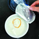 酸奶吃出橡皮筋疑似避孕套 细数食品中恐怖异物